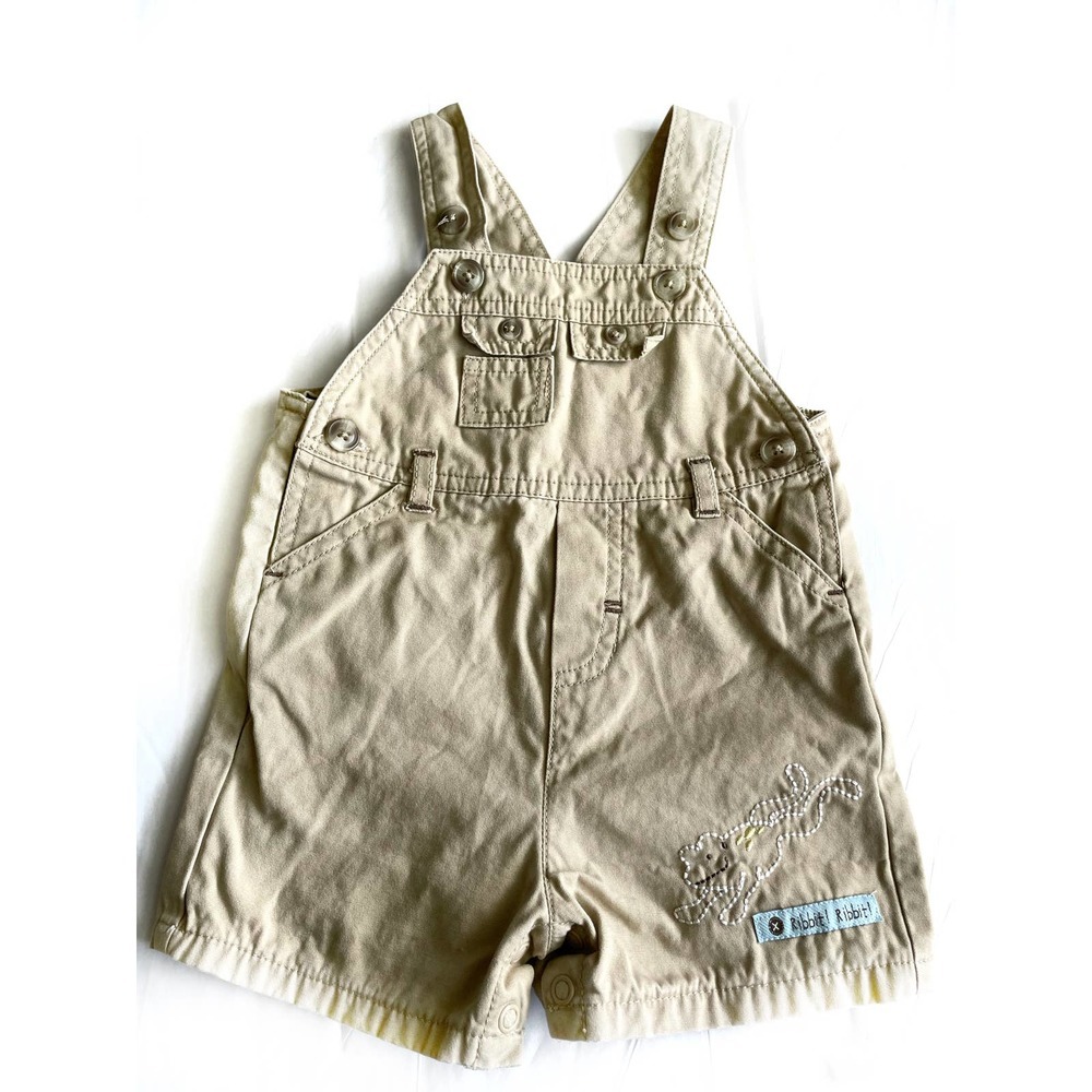 First Moments Layette tan overall shorts w/ frog embroidery. 3-6 months.